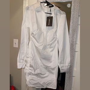 Brand new fitted shirt dress from pretty little thing.